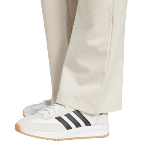 Legginsy damskie adidas Essentials Small Logo Flared kremowe JD3072