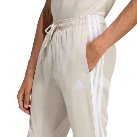 Spodnie męskie adidas 3-Stripes Tricot Regular Tapered beżowe JY7721